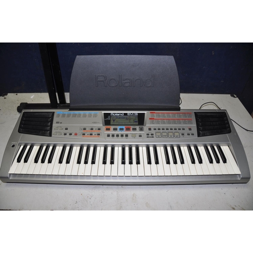 1273 - A ROLAND EM-15 ELECTRIC KEYBOARD with sheet music holder and keyboard stand (PAT pass and working)