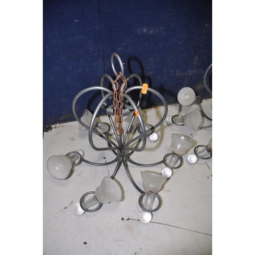 1315 - TWO METAL CHANDELLIER with glass bell shaped wax inserts along with a unbranded ceiling fan and ligh... 