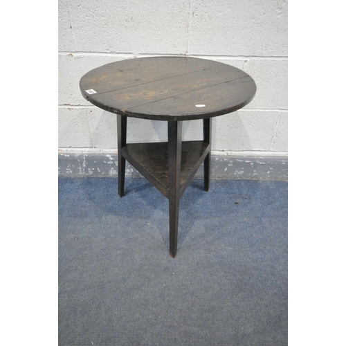 1587 - A GEORGIAN OAK CIRCULAR CRICKET TABLE, on  tapered legs, united by an undershelf, diameter 57cm x he... 