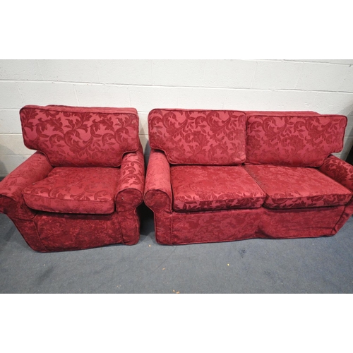 1593 - A BEIGE UPHOLSTERED TWO PIECE SUITE, comprising a two seater sofa and an armchair, both with red flo... 