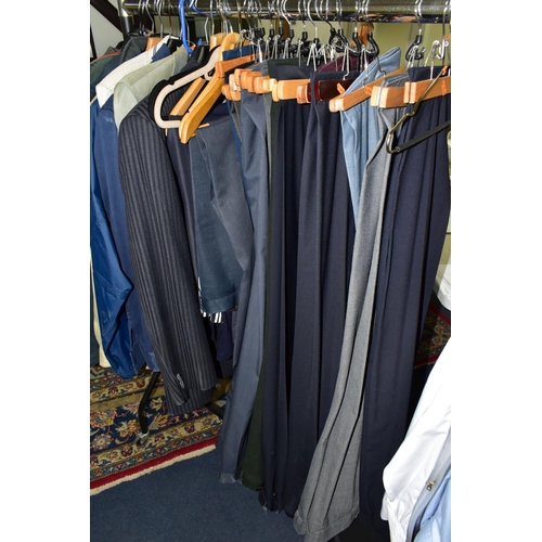 394 - A QUANTITY OF MEN'S CLOTHING, to include eleven jackets, blazers, overcoats, dinner suit (M&S), most... 