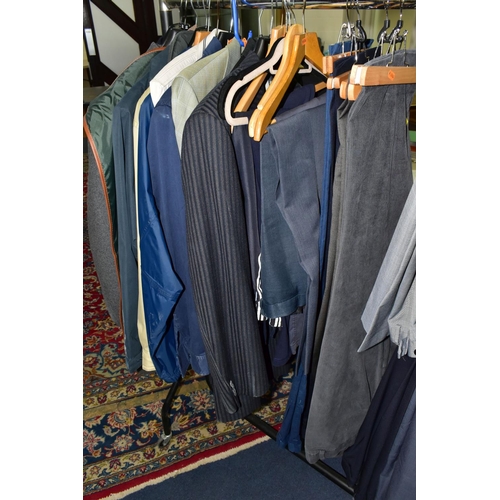 394 - A QUANTITY OF MEN'S CLOTHING, to include eleven jackets, blazers, overcoats, dinner suit (M&S), most... 