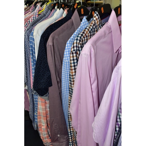 394 - A QUANTITY OF MEN'S CLOTHING, to include eleven jackets, blazers, overcoats, dinner suit (M&S), most... 