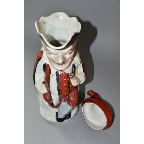 435 - A STAFFORDSHIRE TOBY JUG IN THE FORM OF MR PUNCH, with red, black and white striped outfit, the hat ... 