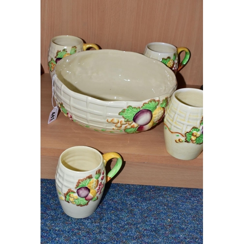 441 - A CLARICE CLIFF 'FRUIT BASKET' FRUIT BOWL AND FOUR MUGS, with relief moulded fruits and basketweave ... 