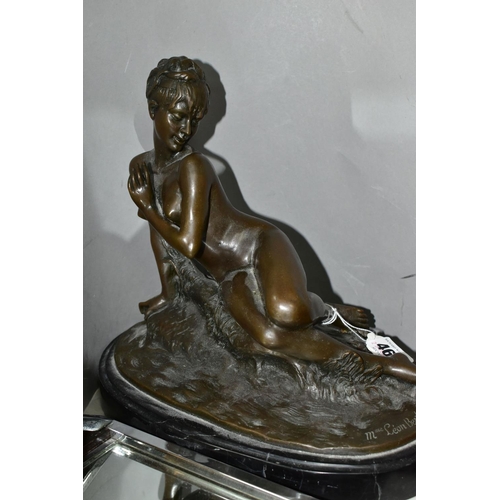 464 - A MODERN BRONZE FIGURINE, 'Young woman bathing'  (after Mme. Leon Bertaux) on an oval black marble p... 