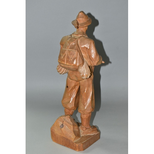 468 - A HAND CARVED PINE WOOD FIGURE, of a mountain climber, 'Paul Émile Caron' style, height 42cm (1) (Co... 