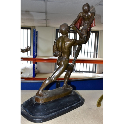 483 - A MODERN BRONZE SCULPTURE, of a man and woman, the male dancer is hoisting the woman in the air, whi... 