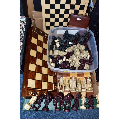 522 - TWO BOXES OF CHESS BOARDS, SET AND PIECES, comprising a folding chess board fitted with wooden piece... 