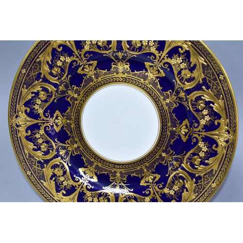 537 - TWO ROYAL WORCESTER PLATES, comprising a Royal Worcester cabinet plate, with heavy gilt decoration o... 