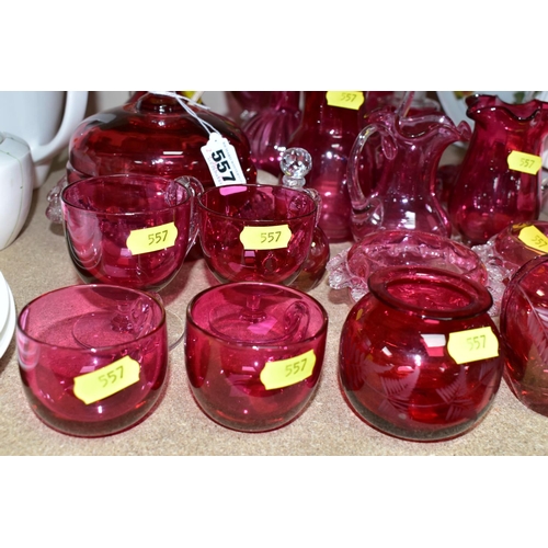 557 - A COLLECTION OF CRANBERRY GLASSWARE, comprising two cut glass decanters, height 26cm, 15cm, with cle... 