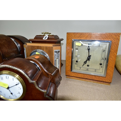 563 - A GROUP OF SIX CLOCKS AND BAROMETER, to include an 'Art Deco' style wooden cased mantel clock, heigh... 