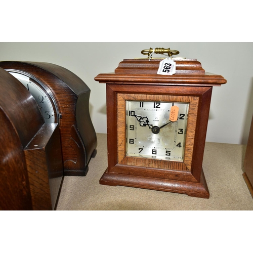 563 - A GROUP OF SIX CLOCKS AND BAROMETER, to include an 'Art Deco' style wooden cased mantel clock, heigh... 