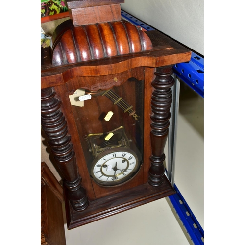 565 - A COLLECTION OF FIVE CLOCKS, to include a late 19th century black slate mantel clock, made by Ansoni... 