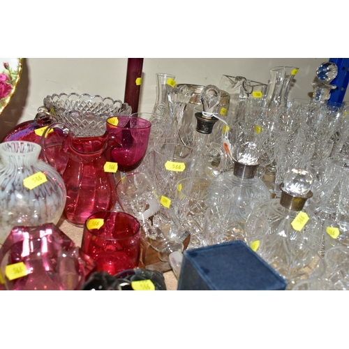 566 - A GROUP OF ASSORTED CUT GLASS AND CRYSTAL, to include two cut glass perfume bottles with silver coll... 