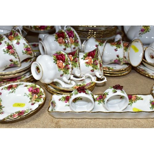 567 - A ROYAL ALBERT 'OLD COUNTRY ROSES' PATTERN PART DINNER AND TEA SERVICE, comprising twelve teacups, t... 