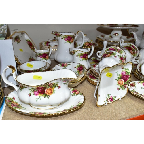 567 - A ROYAL ALBERT 'OLD COUNTRY ROSES' PATTERN PART DINNER AND TEA SERVICE, comprising twelve teacups, t... 