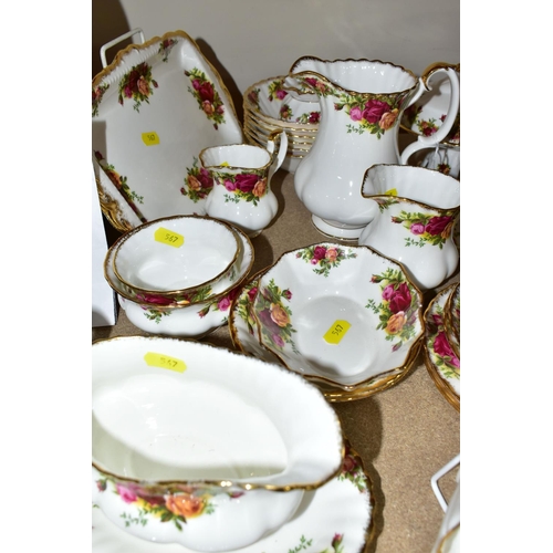 567 - A ROYAL ALBERT 'OLD COUNTRY ROSES' PATTERN PART DINNER AND TEA SERVICE, comprising twelve teacups, t... 