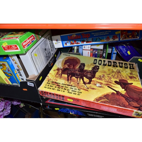 572 - THREE BOXES OF FAMILY BOARD GAMES, to include Waddington's 'Lost Valley of the Dinosaurs', Goldrush,... 