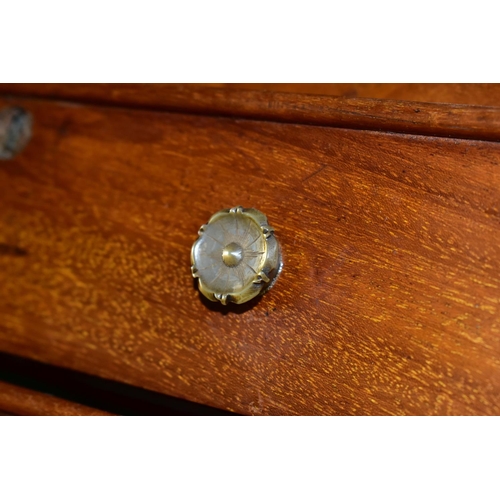 582 - A MINIATURE MAHOGANY CHEST OF DRAWS WITH GALLERIED MIRROR, having two short draws over three long dr... 