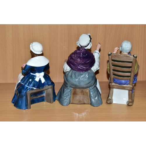 597 - THREE ROYAL DOULTON SEATED FIGURINES,  comprising 'Royal Govenor's Cook' HN2233, 'Schoolmarm' HN2223... 