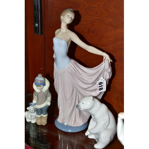 618 - THREE LLADRO FIGURES, comprising 'Eskimo Boy with Pet' 5238, designed by Juan Huerta, 'The Dancer' 5... 