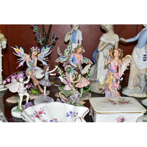 624 - A GROUP OF ORNAMENTS AND GIFTWARES, to include a Nao figurine of a girl with a puppy, a Nao duck, tw... 