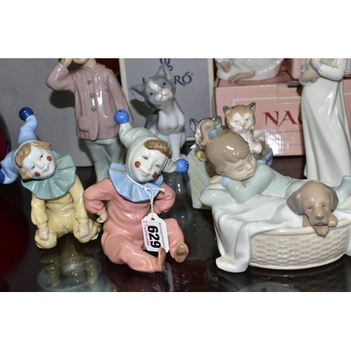 629 - A BOXED LLADRO CAT, AND A GROUP OF LLADRO FIGURINES, comprising a boxed Lladro Cat 5113, boxed Nao: ... 