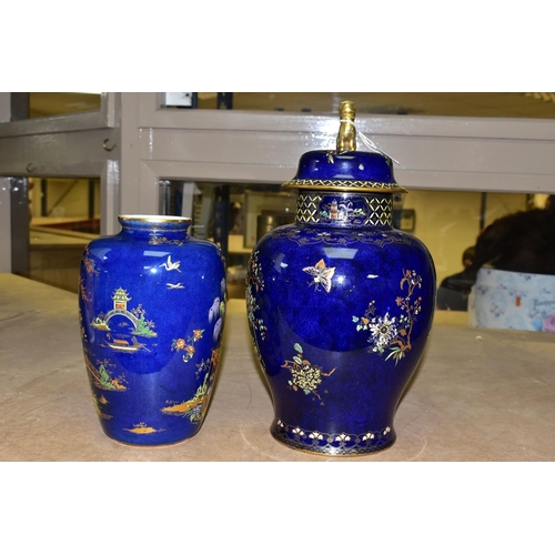 649 - A CARLTON WARE VASE AND GINGER JAR, the vase height 23cm, decorated with Willow Pattern in polychrom... 