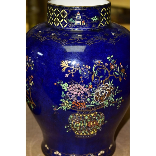 649 - A CARLTON WARE VASE AND GINGER JAR, the vase height 23cm, decorated with Willow Pattern in polychrom... 