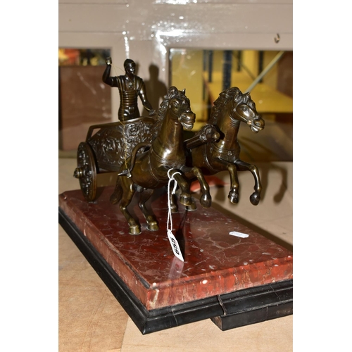 655 - A BRONZE FIGURE OF A ROMAN CHARIOTEER, on a rouge marble base, length 42cm x width 21cm (1) (Conditi... 