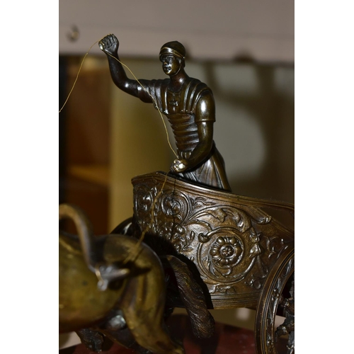 655 - A BRONZE FIGURE OF A ROMAN CHARIOTEER, on a rouge marble base, length 42cm x width 21cm (1) (Conditi... 