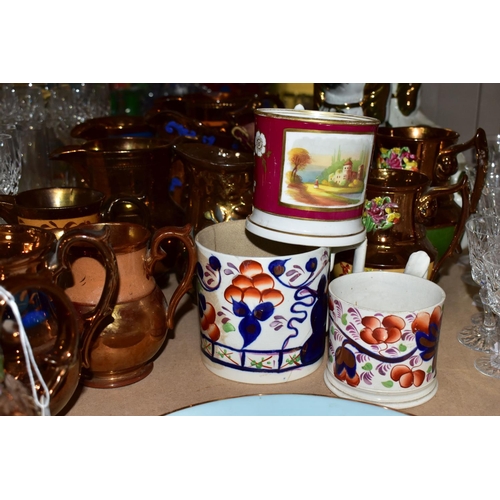 657 - A GROUP OF VICTORIAN STAFFORDSHIRE COPPER LUSTRE WARE, to include twelve jugs some with three blue l... 