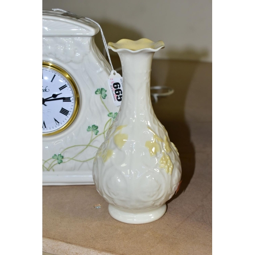 665 - A BELLEEK CERAMIC DAISY CLOCK, green backstamp, quartz movement, approximate height 20cm, together w... 