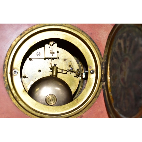 666 - A RED MARBLE CLOCK GARNITURE WITH A URANIUM GLASS DIAL, Arabic numeral hour markers, Japy Freres bel... 