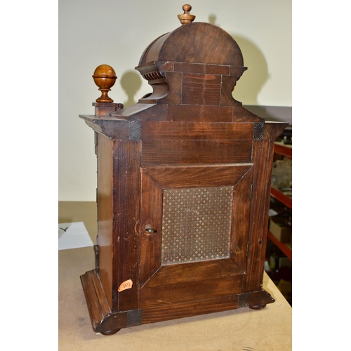 667 - A WALNUT CASED CHIMING  MANTLE CLOCK, possibly with a replacement dial and movement, the silvered ch... 