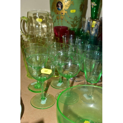 669 - A SELECTION OF GLASS WARES TO INCLUDE URANIUM GLASS ITEMS, with two finger bowls, jug and six glasse... 