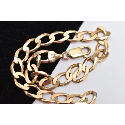 85 - A 9CT YELLOW GOLD BRACELET, designed as a flat curb link chain with lobster clasp, approximate lengt... 