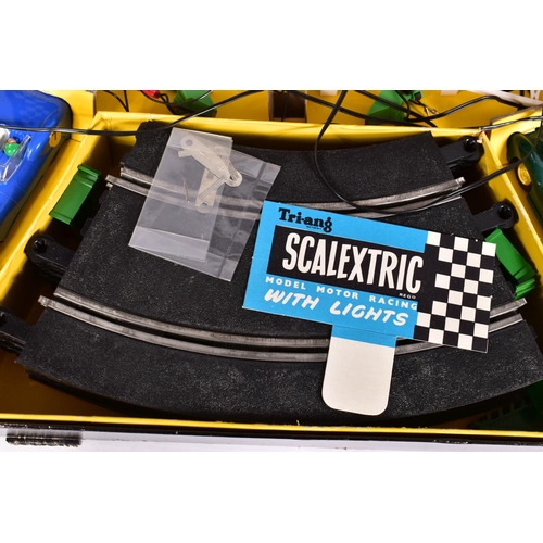 10 - A BOXED SCALEXTRIC COMPETITION CAR SERIES WITH LIGHTS SET, No.CM.34, complete with both cars, Aston ... 