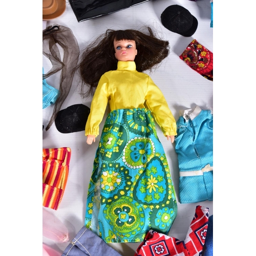 29 - AN UNBOXED PALITOY ACTION GIRL DOLL, CLOTHING AND ACCESSORIES, doll complete and in very good condit... 