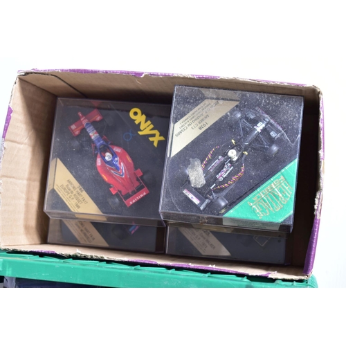 38 - A QUANTITY OF BOXED 1/43 SCALE FORMULA 1 RACING CAR MODELS, mainly from the Panini F1 collection par... 