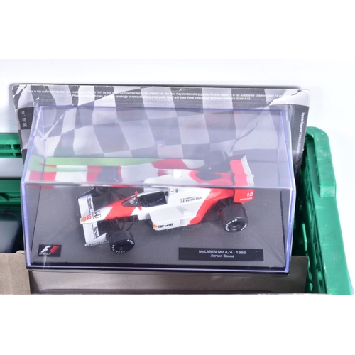 38 - A QUANTITY OF BOXED 1/43 SCALE FORMULA 1 RACING CAR MODELS, mainly from the Panini F1 collection par... 