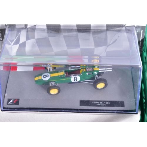 38 - A QUANTITY OF BOXED 1/43 SCALE FORMULA 1 RACING CAR MODELS, mainly from the Panini F1 collection par... 