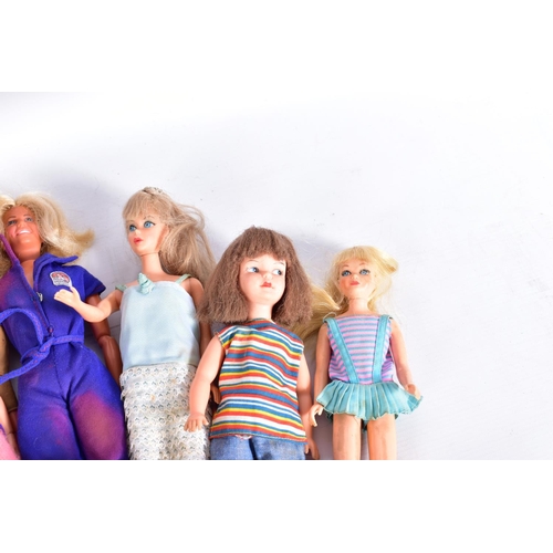 61 - A COLLECTION OF 1960'S AND 1970'S DOLLS, to include two Pedigree Sindy dolls (one earlier version wi... 