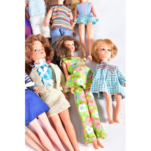 61 - A COLLECTION OF 1960'S AND 1970'S DOLLS, to include two Pedigree Sindy dolls (one earlier version wi... 