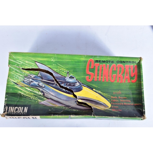 76 - A BOXED LINCOLN INTERNATIONAL PLASTIC BATTERY OPERATED REMOTE CONTROL STINGRAY SUBMARINE, not tested... 