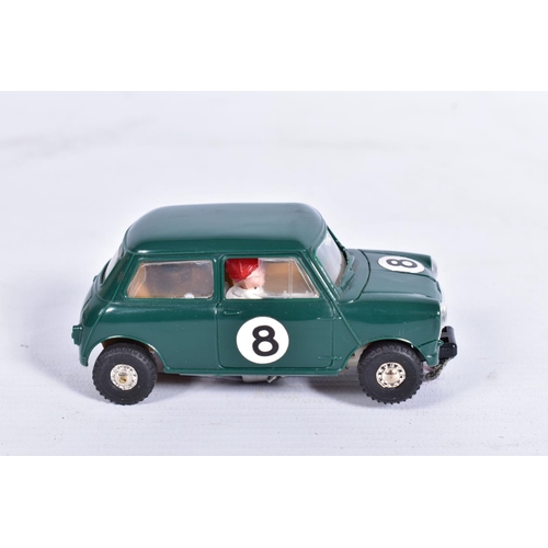 9 - A BOXED SCALEXTRIC MINI COOPER, No.C76, green with RN8, complete with driver and in good condition w... 