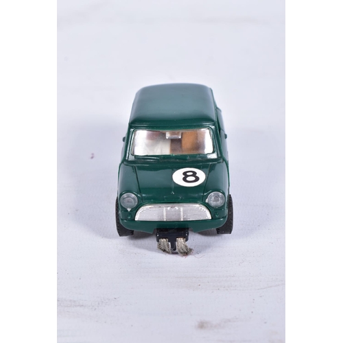 9 - A BOXED SCALEXTRIC MINI COOPER, No.C76, green with RN8, complete with driver and in good condition w... 