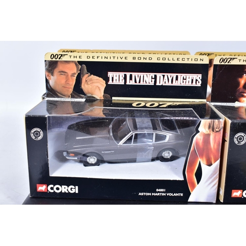 123 - A QUANTITY OF ELEVEN BOXED CORGI CLASSICS MODELS FROM THE DEFINITIVE BOND COLLECTION, all appear com... 