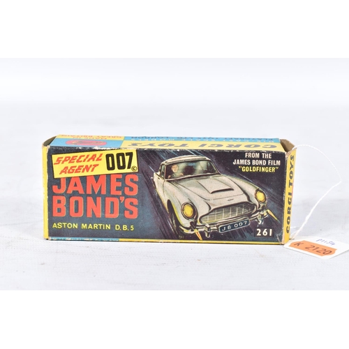 134 - A BOXED CORGI TOYS JAMES BOND ASTON MARTIN DB5, No.261, roof will not stay shut, front guns not work... 